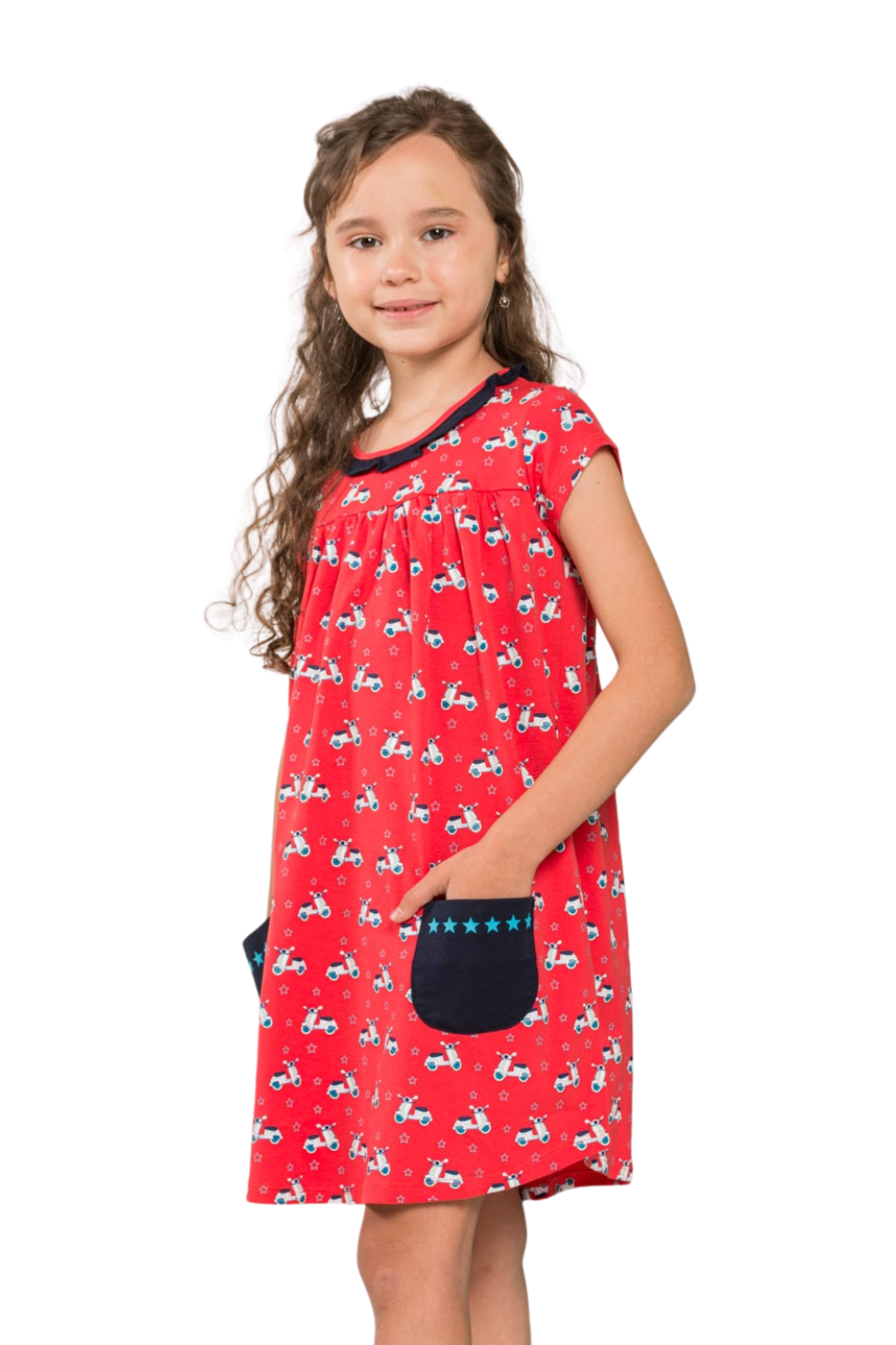Girl laughing and wearing identical red scooter-themed empire dresses with star-lined pockets, tailored from premium cotton.