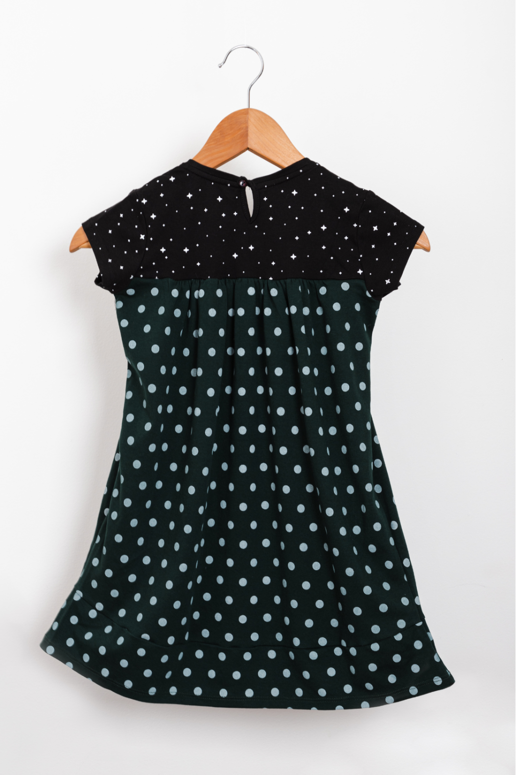 Astro green dress with a keyhole button at the back neck.