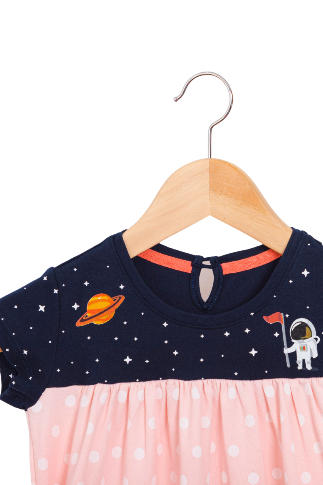 Astro Pink dress features a starry background with charming astronaut and Saturn details on the upper front.